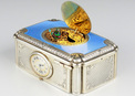 A very fine silver gilt and enamel singing bird box with timepiece, by C. H. Marguerat
