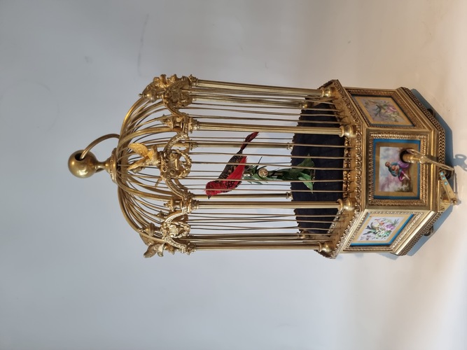 A stunning and very fine  Hexagonal  shaped, gilt bronze and Sevres plaque single singing bird-in-cage, by Bontems