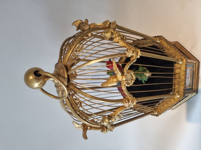 A stunning and very fine  Hexagonal  shaped, gilt bronze and Sevres plaque single singing bird-in-cage, by Bontems