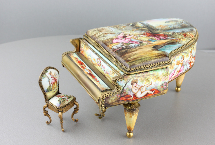 A large vintage Viennese enamel and gilt metal musical grand piano with chair